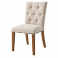 Esszimmerstuhl 50 x 60 x 100 cm beige Textilbezug Holzbeine Chesterfield-Stil